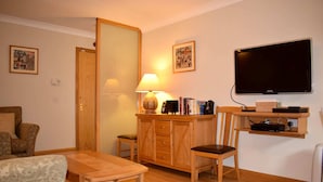 Departamento, 1 habitación | Sala de estar | Televisión 