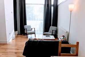 Apartment, 1 Bedroom | Living room | TV