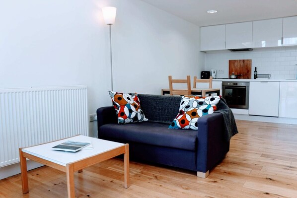Apartment, 1 Bedroom | Living room | TV
