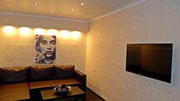 Apartment | Wohnbereich | Flachbildfernseher