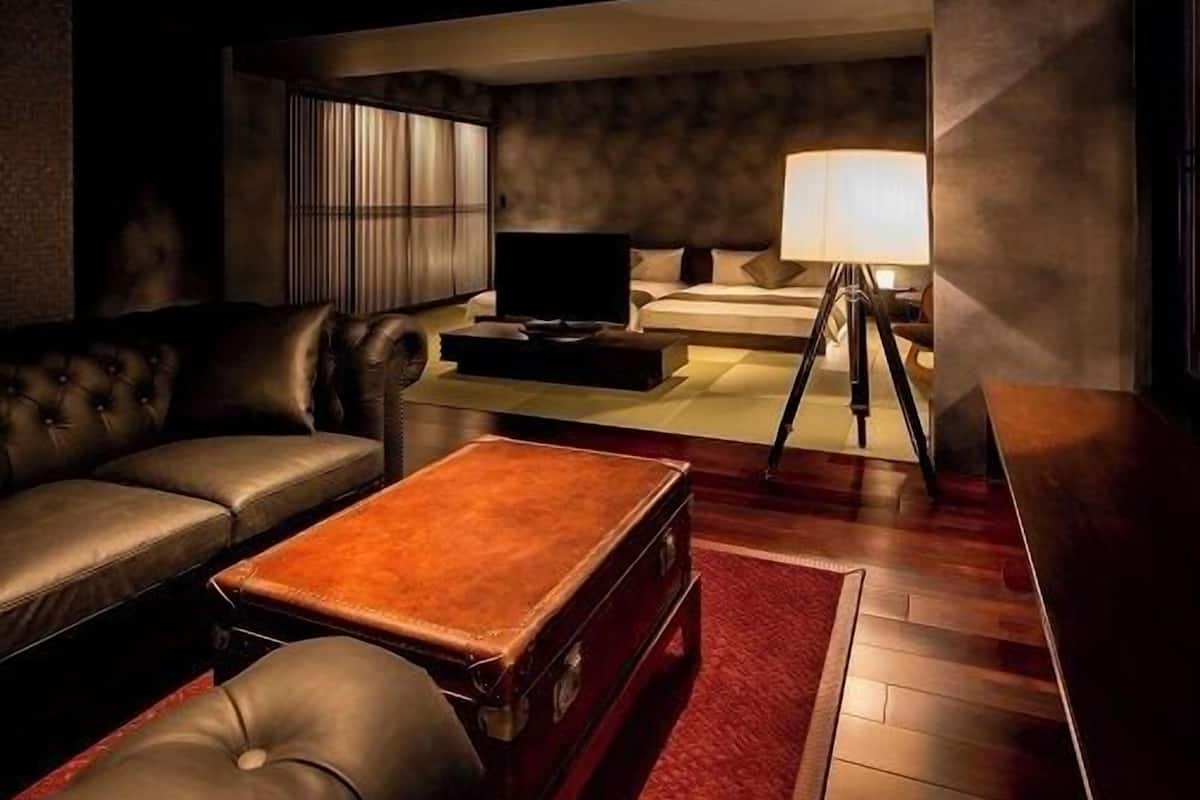 Zona de estar | Una televisión de pantalla plana, películas de pago
