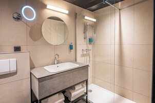 Shower, eco-friendly toiletries, hair dryer, towels