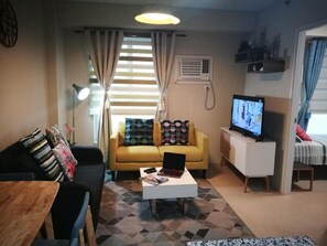Familienapartment | Wohnbereich | Flachbildfernseher