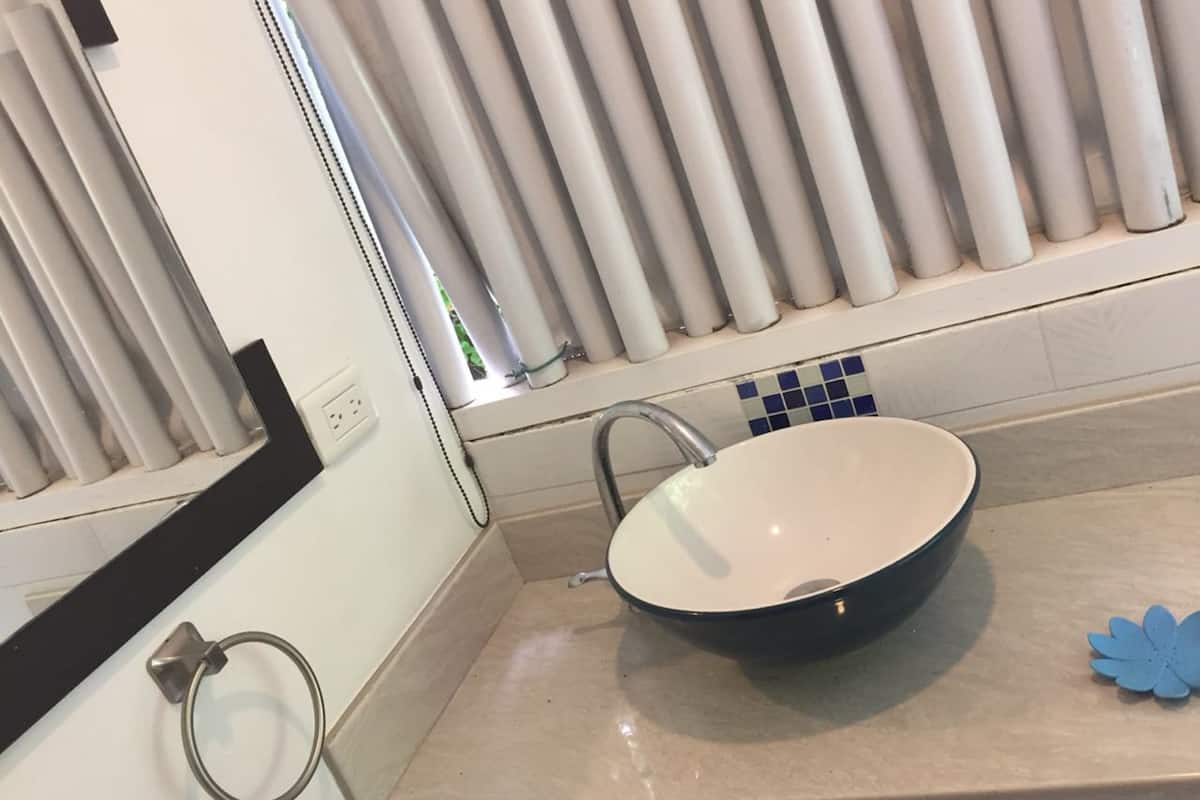 double room, 2 double beds | bathroom sink