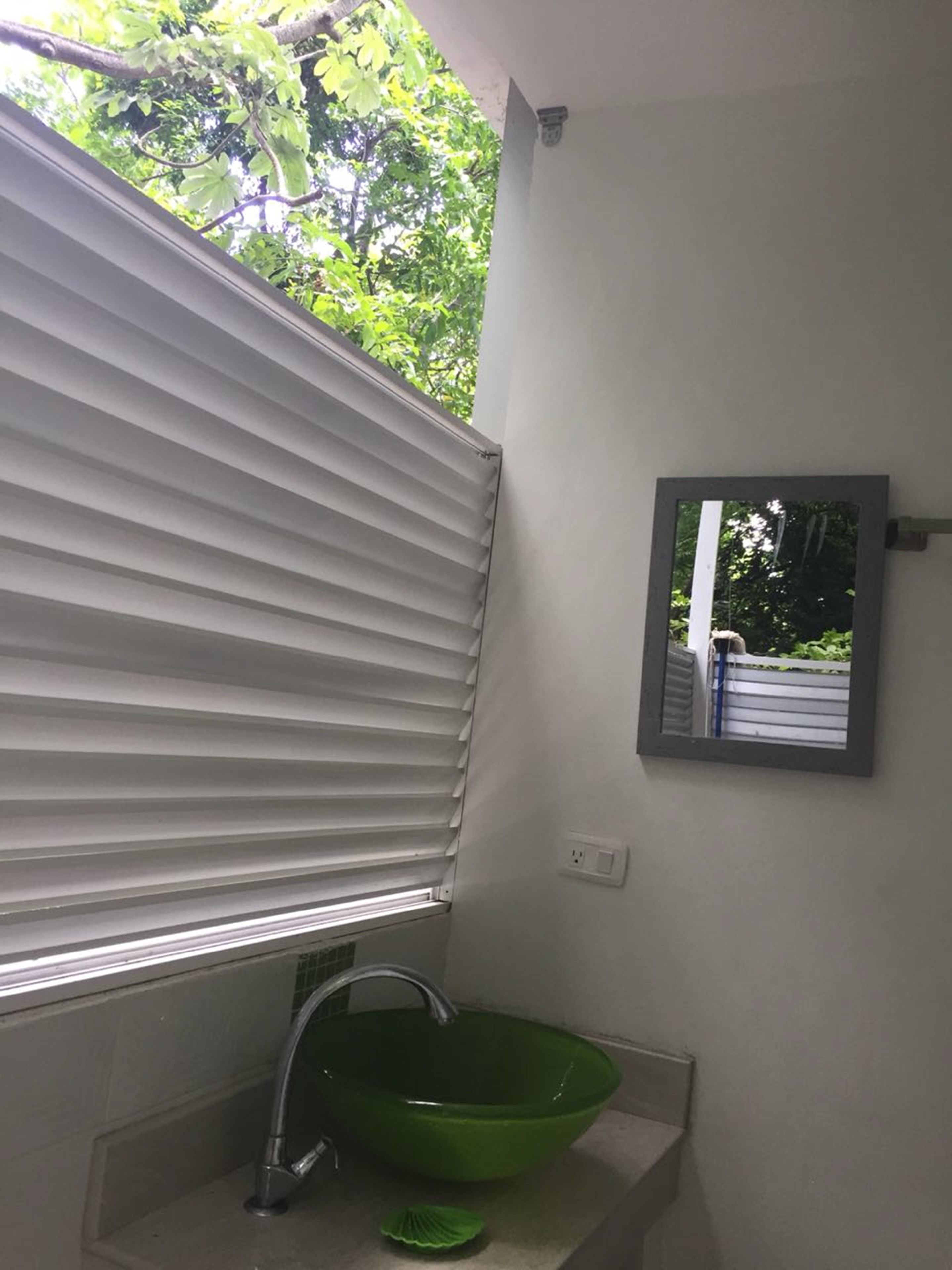 double room, multiple beds | bathroom sink