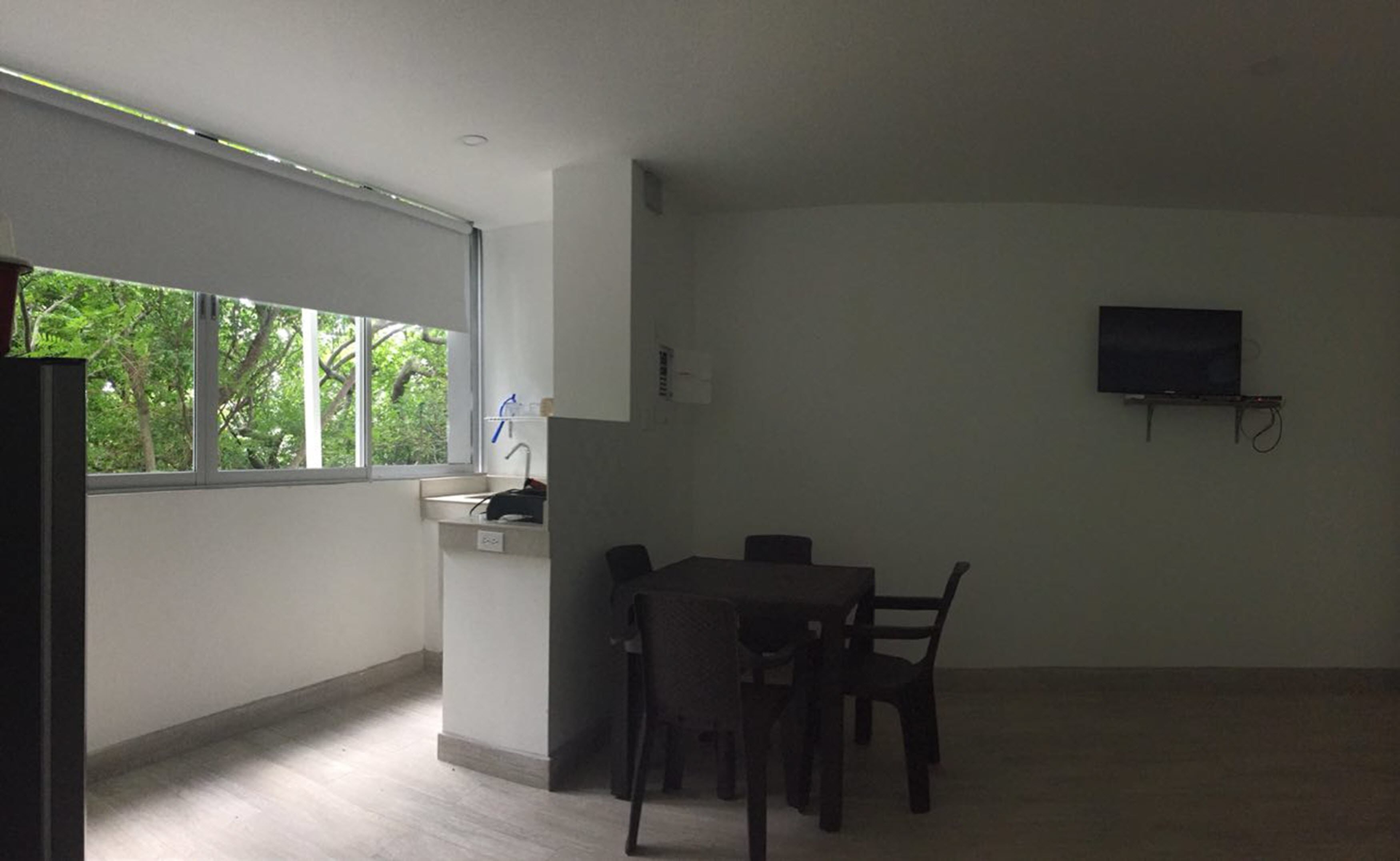 Double Room, Multiple Beds | Living area | Flat-screen TV