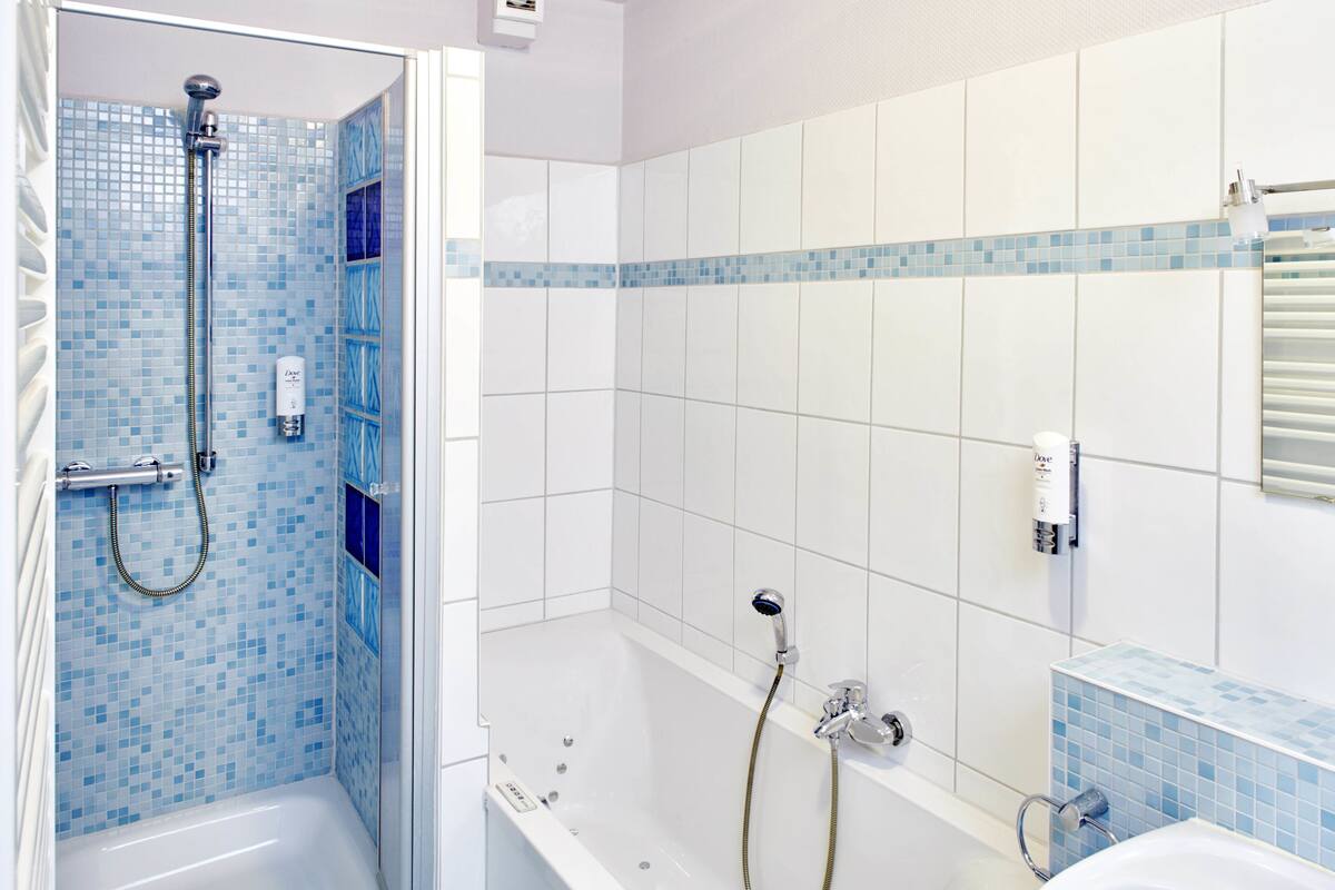family room | bathroom | shower, free toiletries, towels
