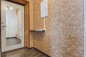 Enter a secure space with a door and electrical outlets.