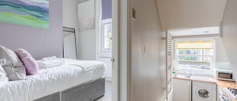 Apartment, 1 Bedroom | 1 bedroom, laptop workspace, iron/ironing board, free wired Internet