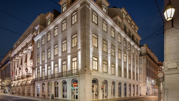 A historic building with multiple stories, large windows, and a classic architectural style. - Aurea Once Upon a House (Lisbon)