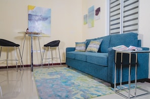 42-inch flat-screen TV with cable channels, TV