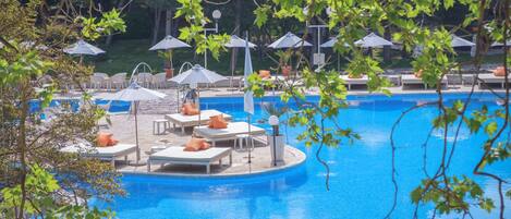 Seasonal outdoor pool, pool umbrellas, pool loungers