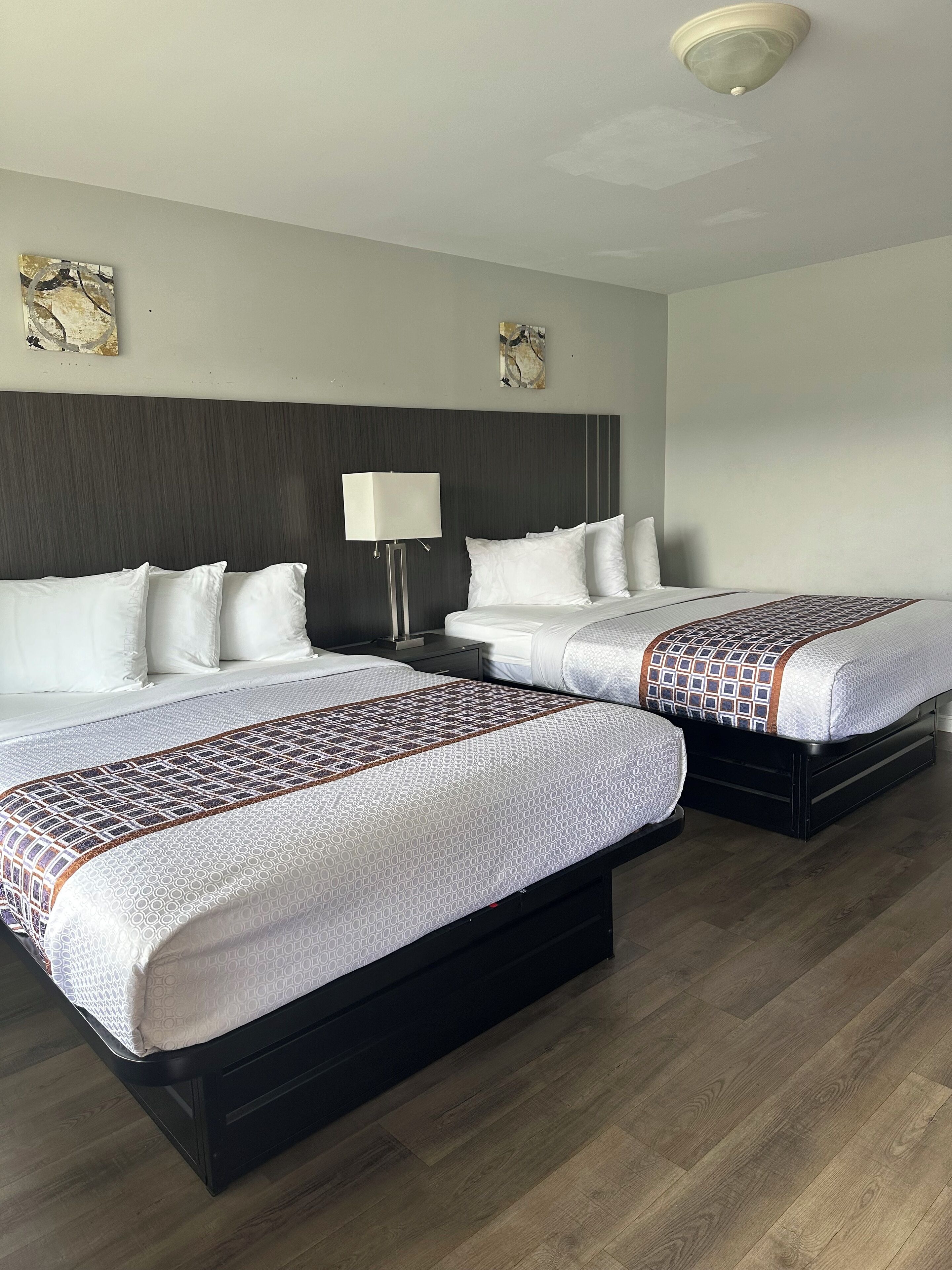 Deluxe Room, 2 Queen Beds, Non Smoking | Blackout curtains, free WiFi, bed sheets