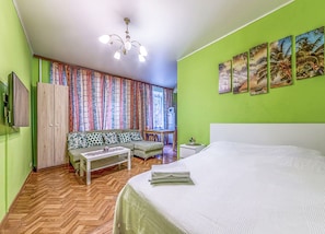 Estudio | Tabla de planchar con plancha, wifi gratis, ropa de cama