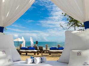 Private beach, free beach shuttle, free beach cabanas, sun loungers