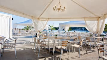 Sun-loungers, beach umbrellas, beach towels, beach volleyball
