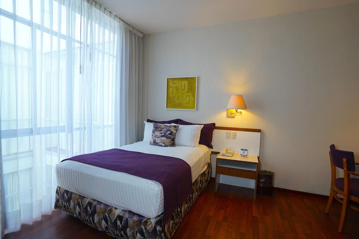 Room, 1 Double Bed | 1 bedroom, in-room safe, desk, blackout curtains