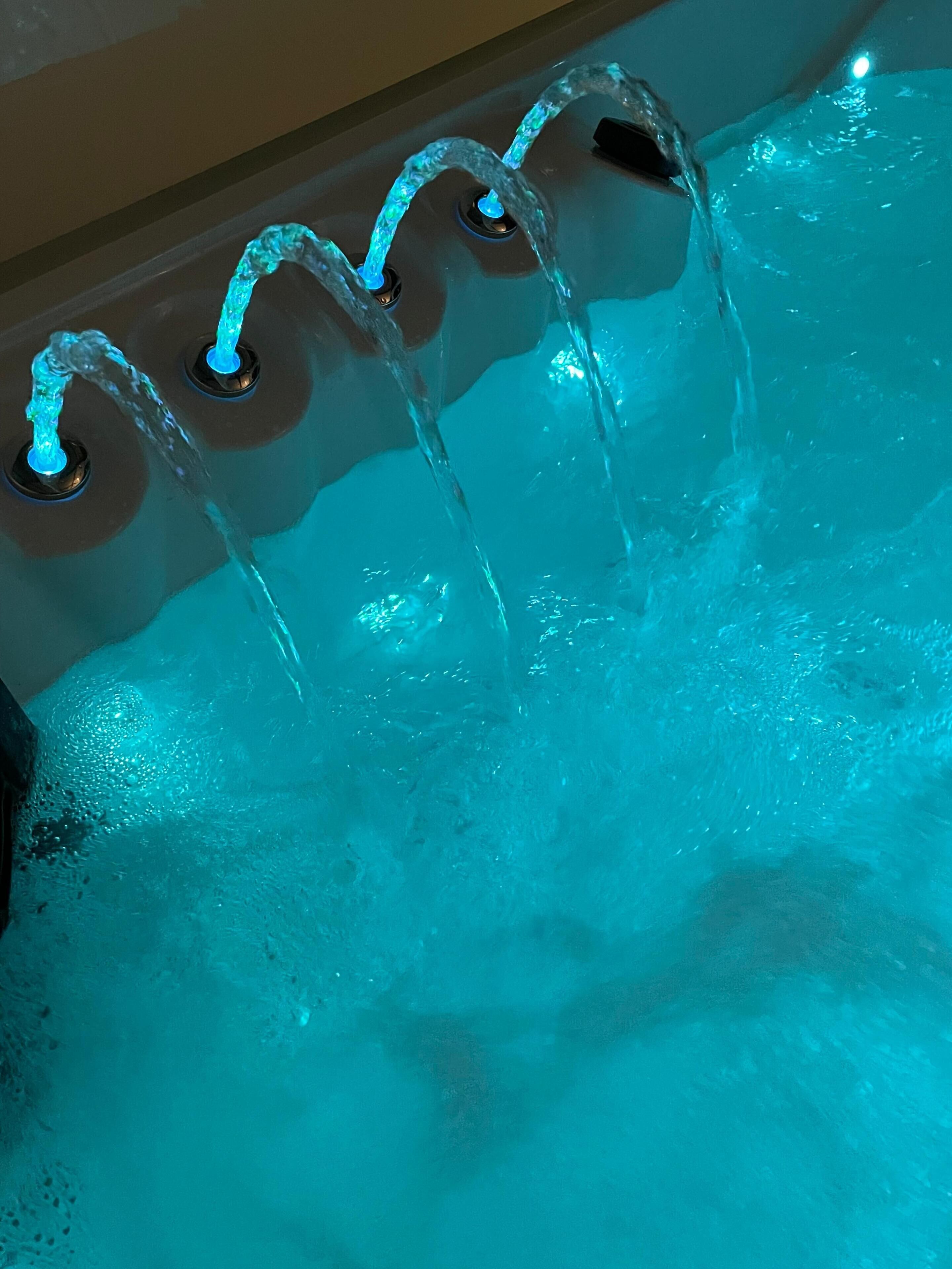 A bathtub with multiple water jets.