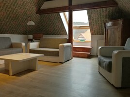 Family Condo, 2 Bedrooms | Living area | Flat-screen TV