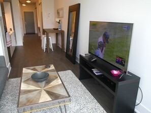 Condo, 1 Queen Bed | Living area | Flat-screen TV