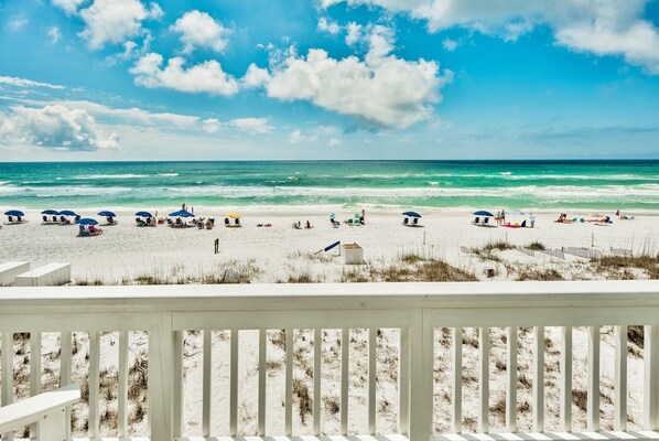 On the beach, sun loungers, beach towels