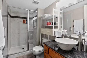 Bathtub, hair dryer, towels, soap