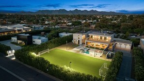 Enjoy a serene retreat with a spacious backyard, swimming pool, and breathtaking mountain views.