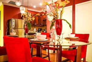 Deluxe Apartment, 1 Queen Bed, Kitchen | Living area | Flat-screen TV