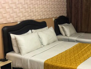 Deluxe Triple Room, 1 Bedroom, City View | 1 bedroom, premium bedding, minibar, in-room safe - Brize Inn (Hulhumalé)