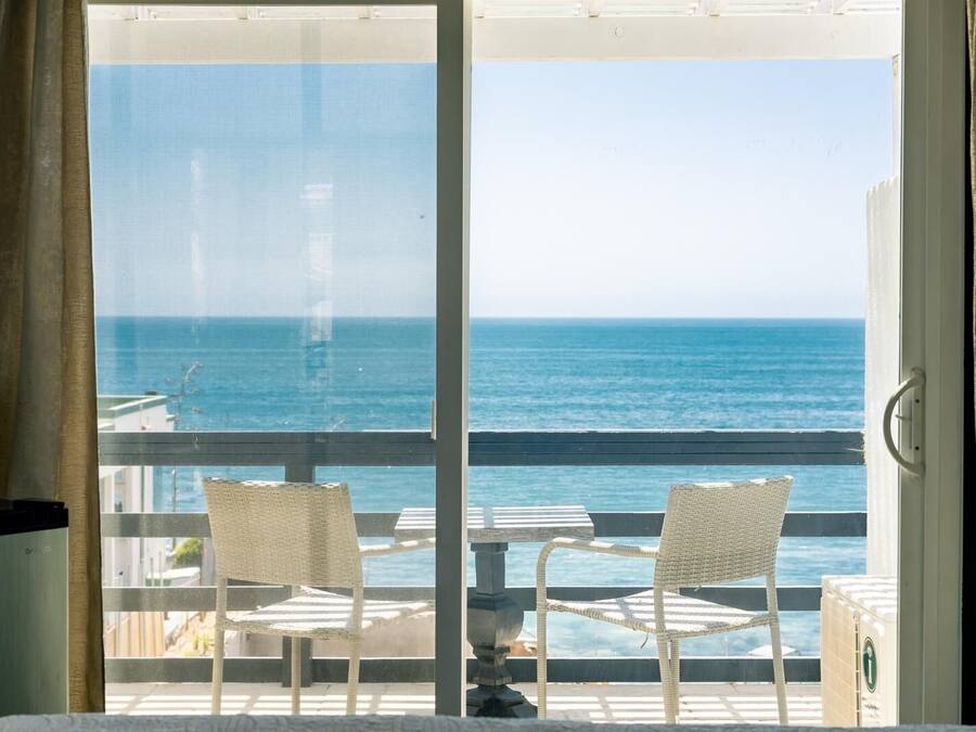 Habitación, 1 cama de matrimonio grande, vistas al mar | Ropa de cama de alta calidad, colchones Tempur-Pedic, cortinas opacas