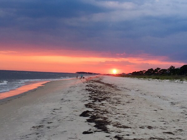 On the beach, sun-loungers, beach umbrellas