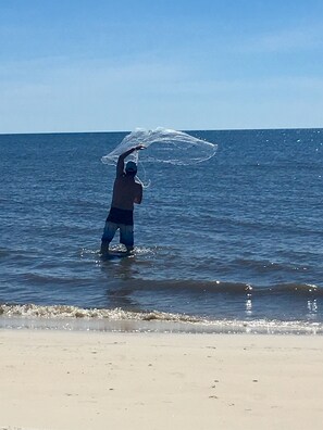 On the beach, sun loungers, beach umbrellas