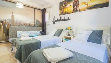 4 dormitorios, tabla de planchar con plancha, wifi gratis y ropa de cama