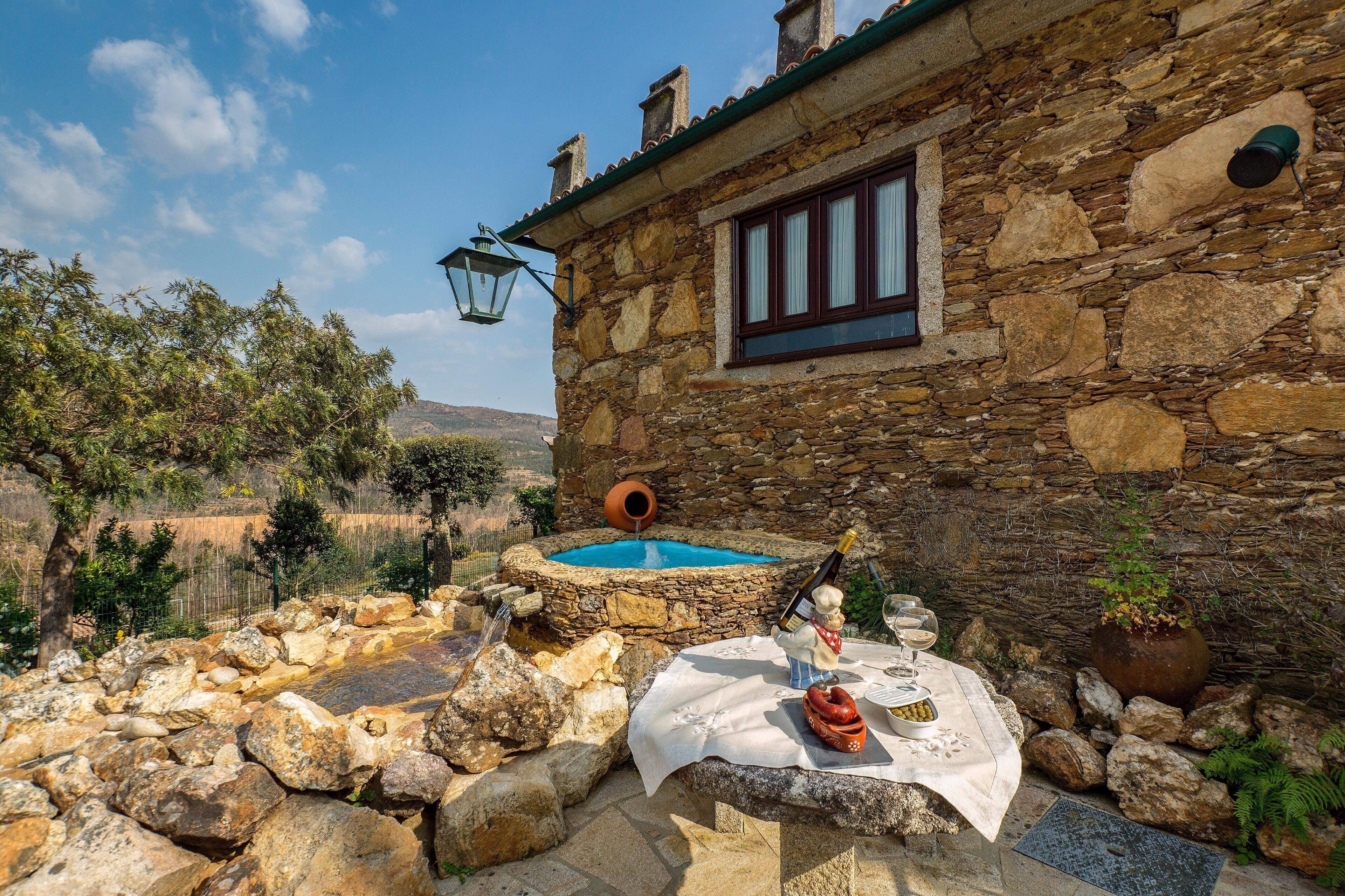 Bañera de hidromasaje al aire libre