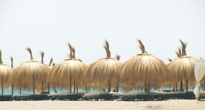 In Strandnähe, Liegestühle, Strandtücher