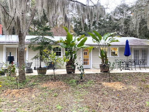 A comfortable home in a quiet neighborhood graced with Spanish Moss draped oaks.