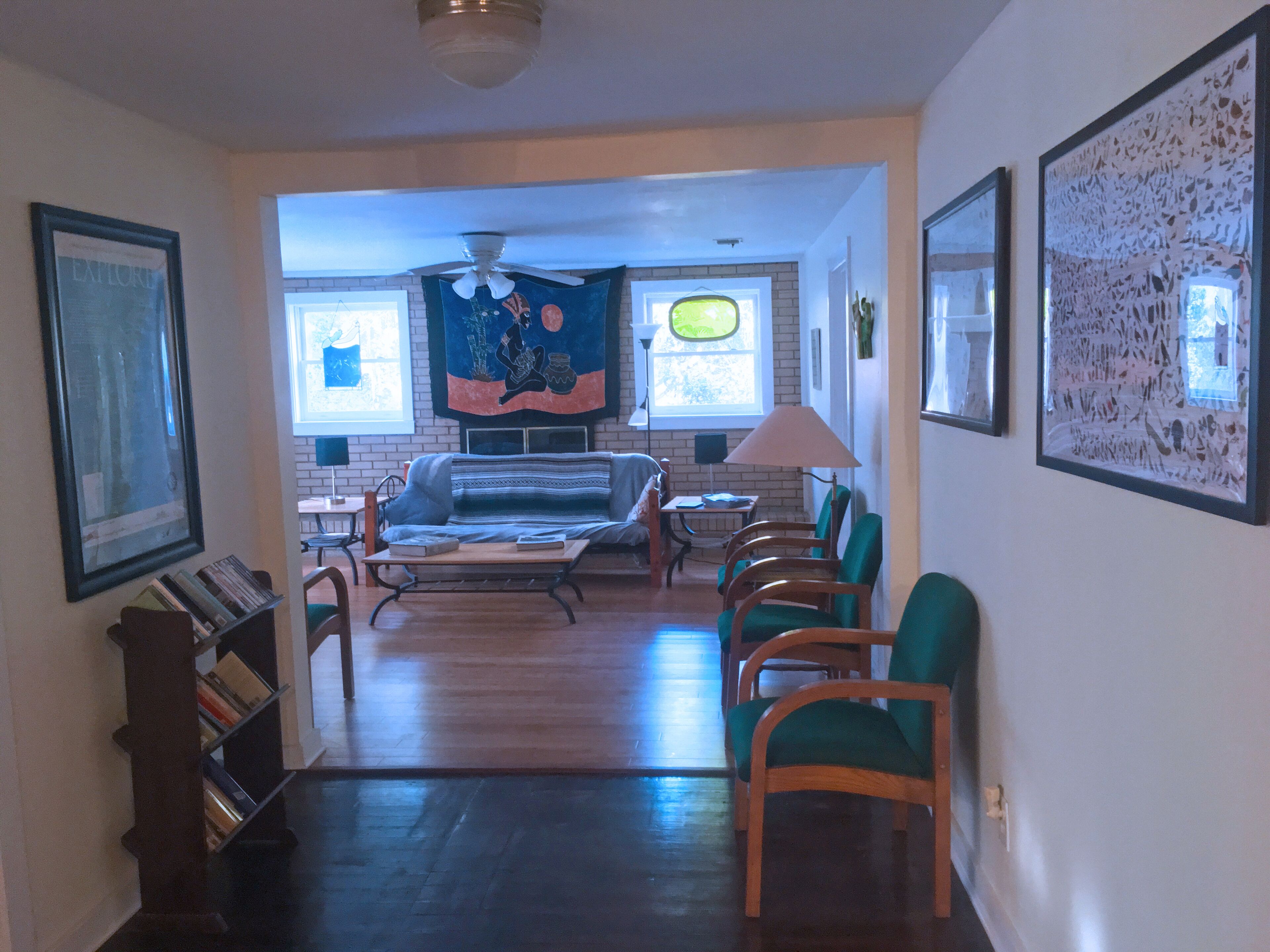 A comfortable home in a quiet neighborhood graced with Spanish Moss draped oaks.