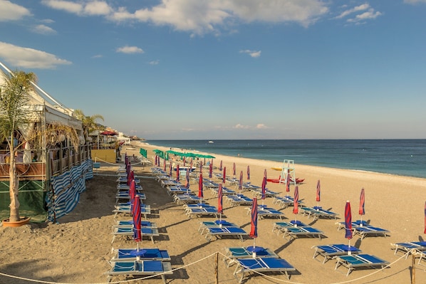 Sulla spiaggia, teli da spiaggia