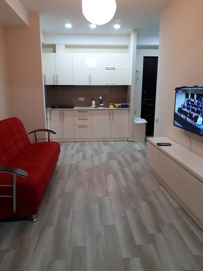 Triple Room | Living area | Flat-screen TV - Samatsa Georgia Apartments (Tbilisi)