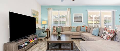 Téléviseur, table de baby-foot