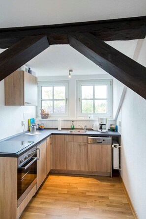 Fridge, oven, dishwasher, high chair