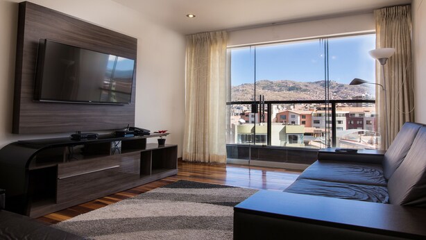 Apartment | Living room | Flat-screen TV - El Sol Cusco Apartamentos (Cusco)