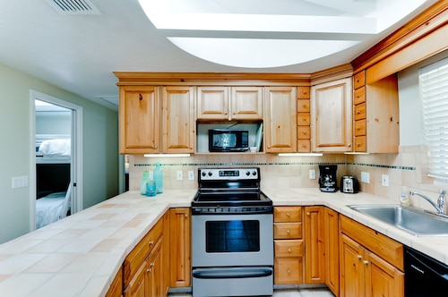 Anna Cabana A: North End Pool Home, Short Walk To Beach by Anna Maria Life Vacation Rentals