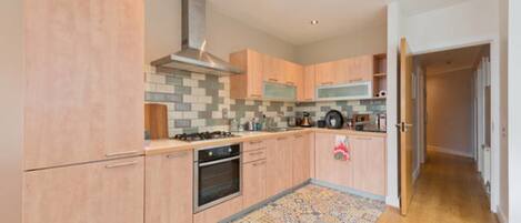 Microwave, coffee/tea maker, cookware/dishes/utensils