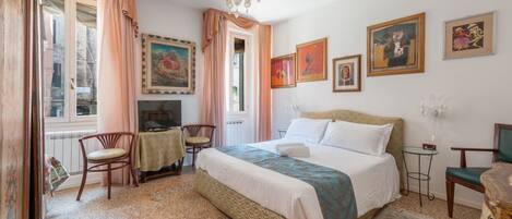3 habitaciones, tabla de planchar con plancha, wifi y ropa de cama