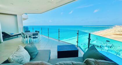 Luxurious Beachfront Condo!! Best location to truly relax and watch the sunsets