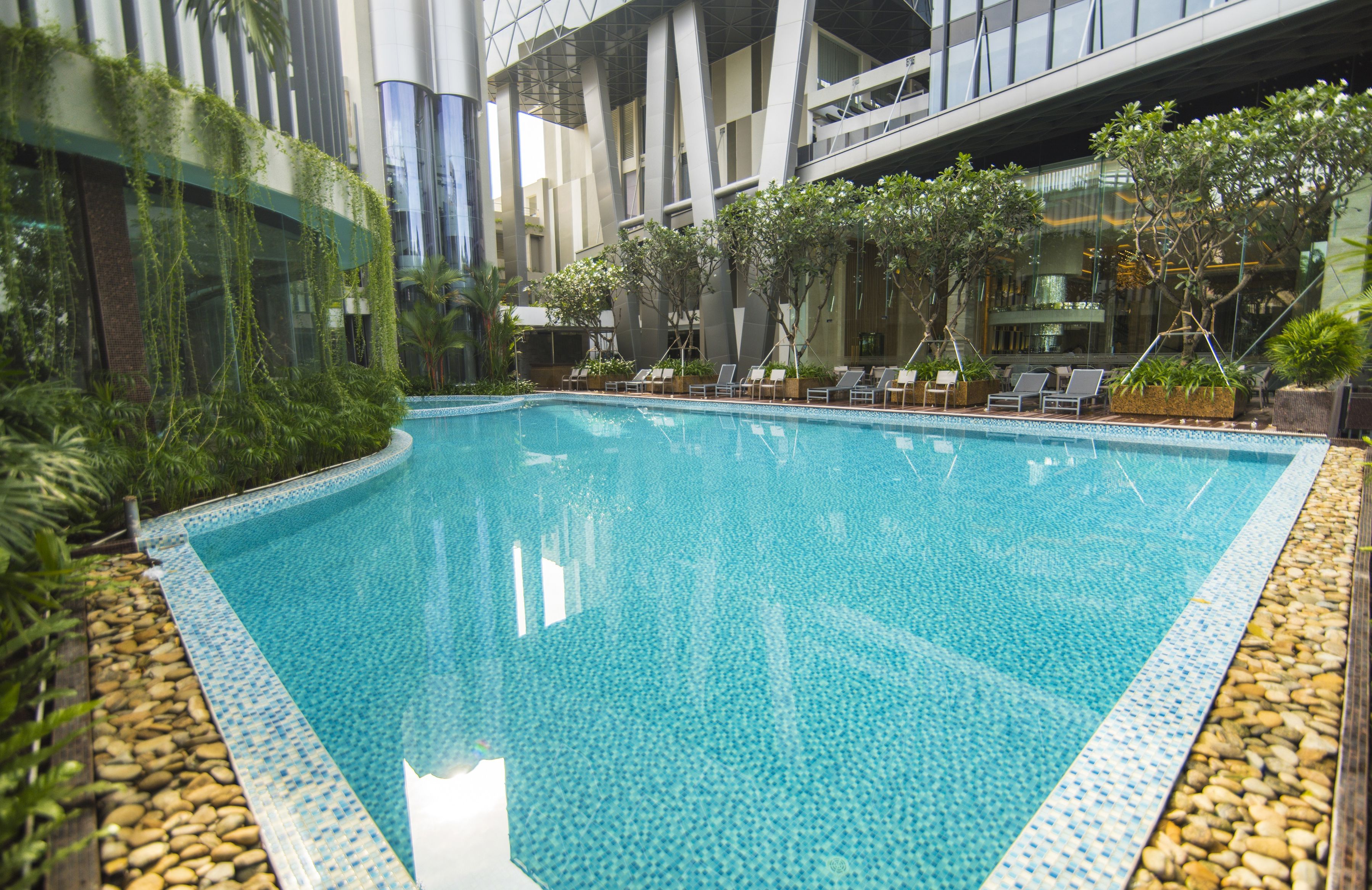 outdoor pool, pool umbrellas, pool loungers