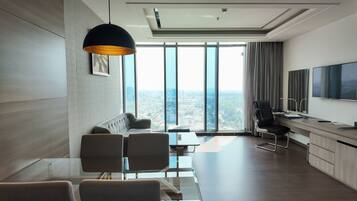 Residence Suite City View | Living area | Flat-screen TV