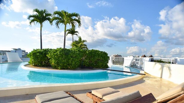 Outdoor pool - Siaan Luxury 2BR Condo by Baitna (Playa del Carmen)