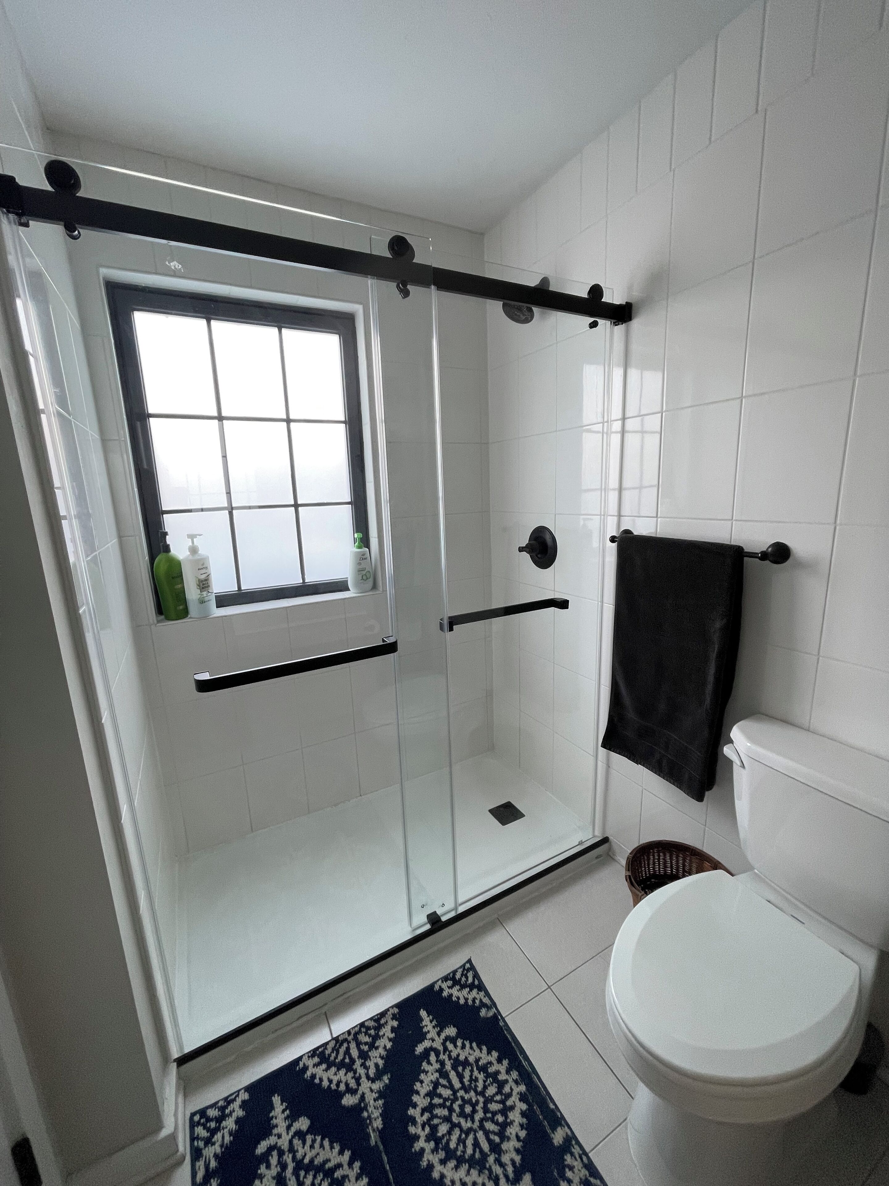 Combined shower/tub, hair dryer, towels, soap